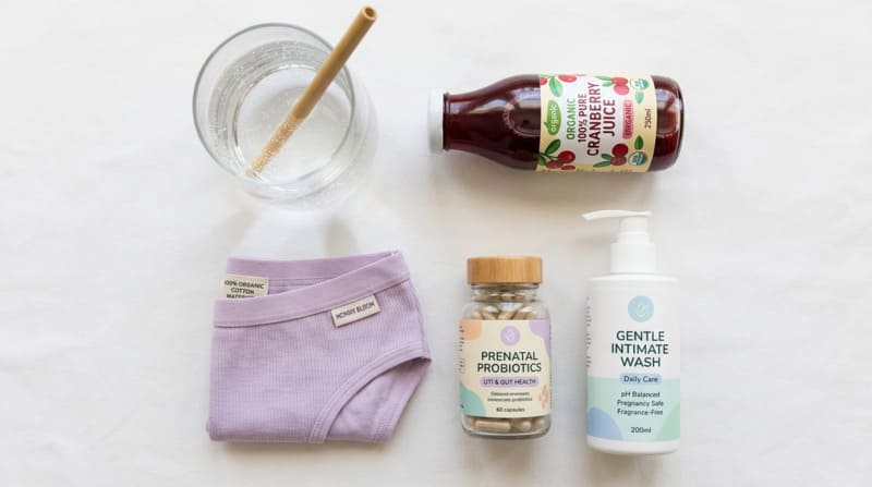 UTI prevention during pregnancy with water cranberry juice and hygiene essentials